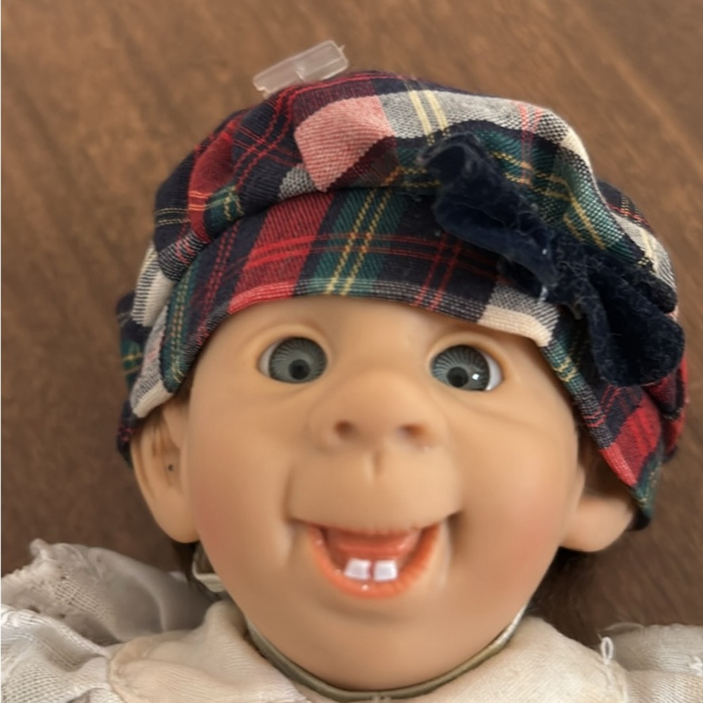 Gi-Go bean bag body 8” baby with dress and matching hat.